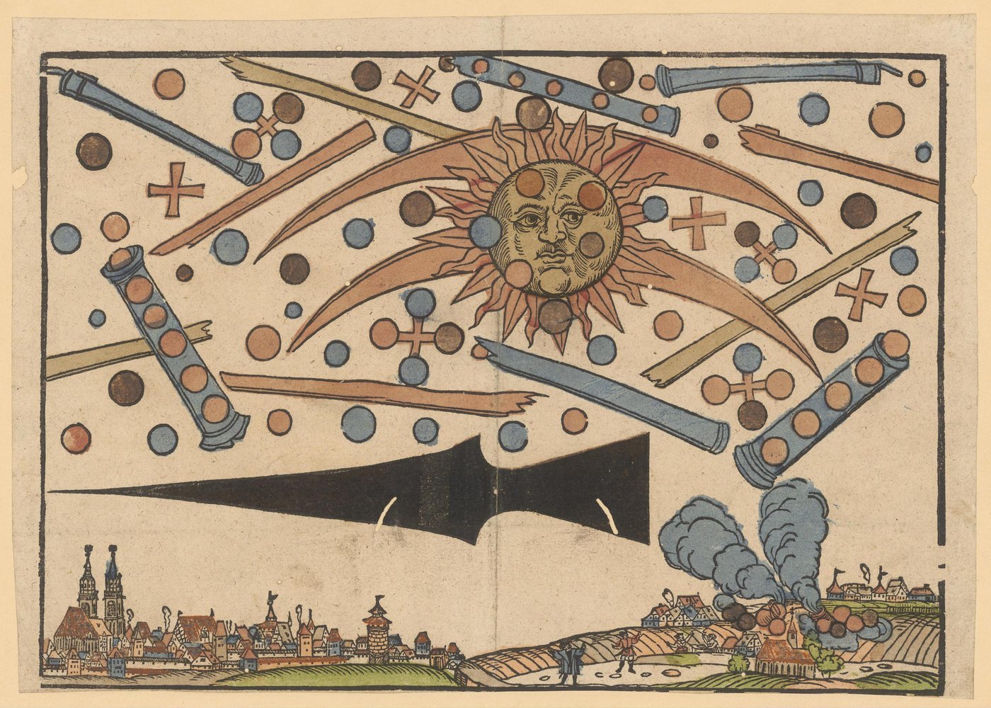 A hand-coloured woodcut of a crowded dawn sky. A sun with a human face sits at the centre, crossed by two long curved bands. Around it are dozens of small spheres in blue, orange and brown, several four-lobed cross shapes, tapering rod forms, and large cylindrical tubes from which rows of spheres emerge. Below them a broad black shape tapers to points at both ends. Along the bottom edge a walled city with two church spires stands at left, and at right smoke rises in thick columns from among houses and fields, watched by two small figures.
